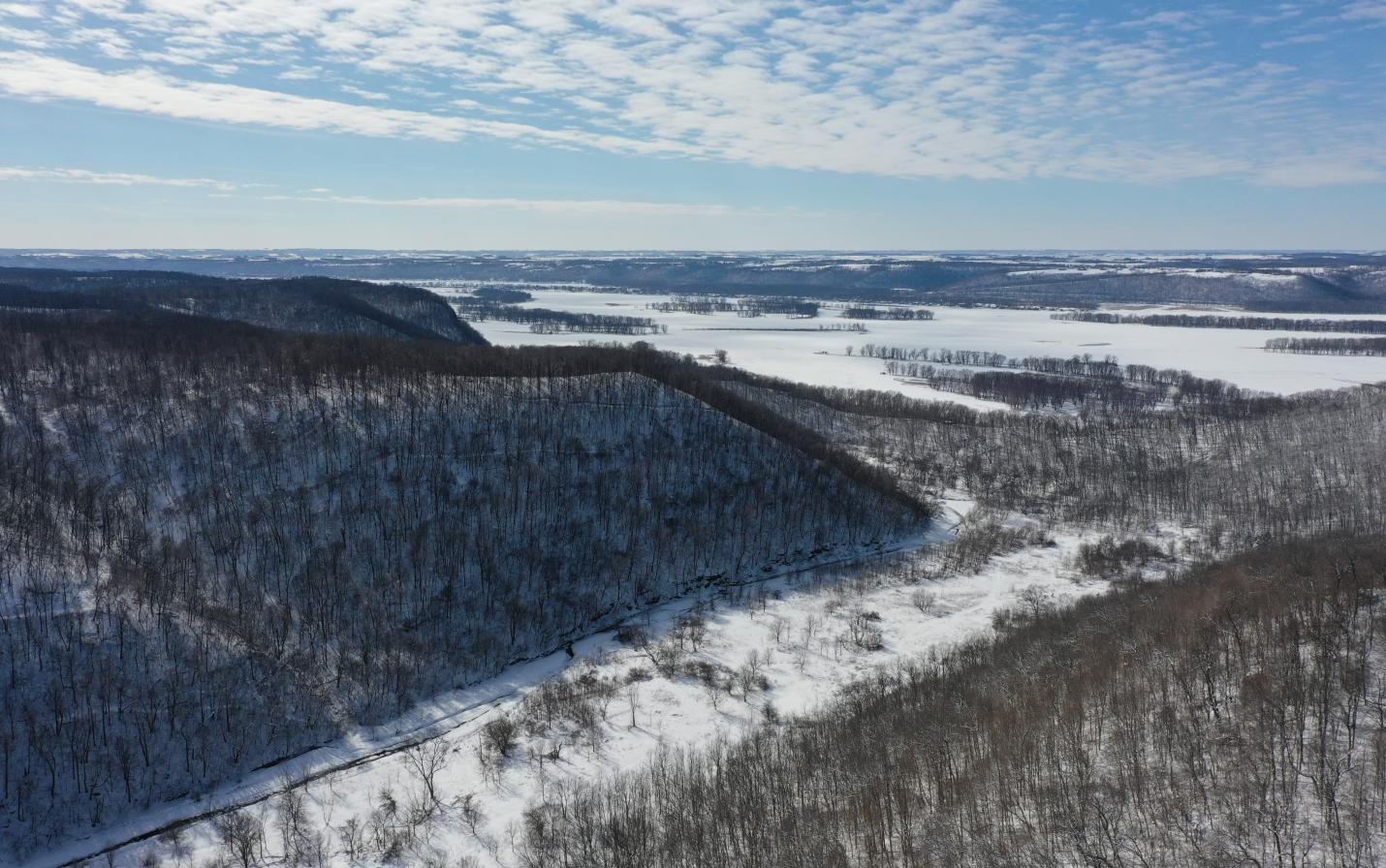 acquired land to expand protection of unique geology, rare plants, animals, and climate